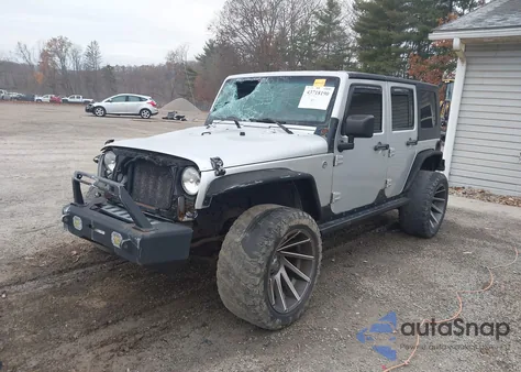 2009 Jeep Wrangler Unlimited Sahara z USA, uszkodzony, nr VIN 1J4GA59119L764823